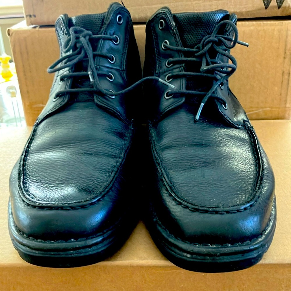 Gently warm Rockport genuine leather man’s boots